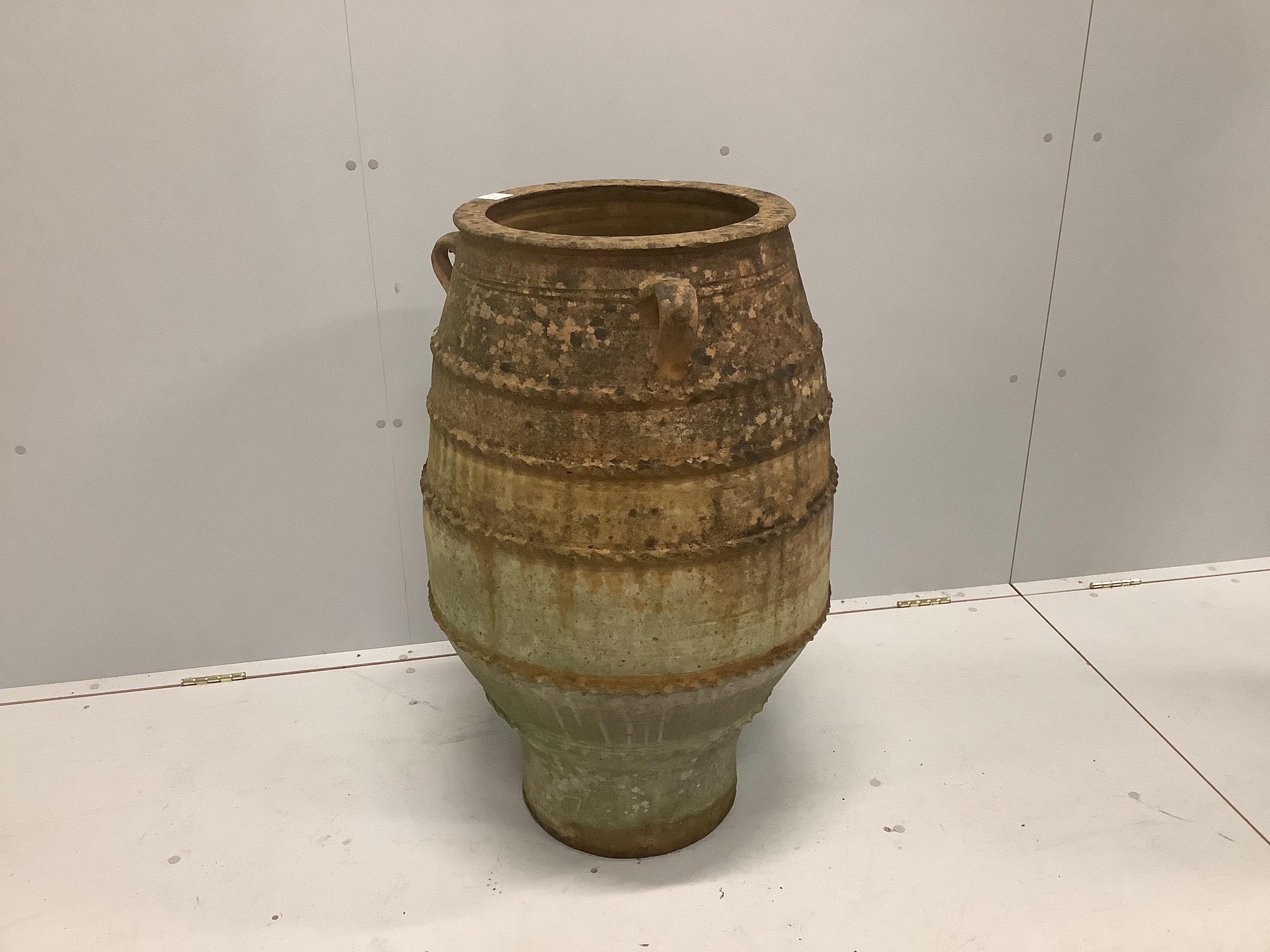 A large Greek style terracotta oil jar, height 91cm